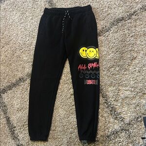 Smiley World black/multi color jogger pants w/ side pockets size 10/12